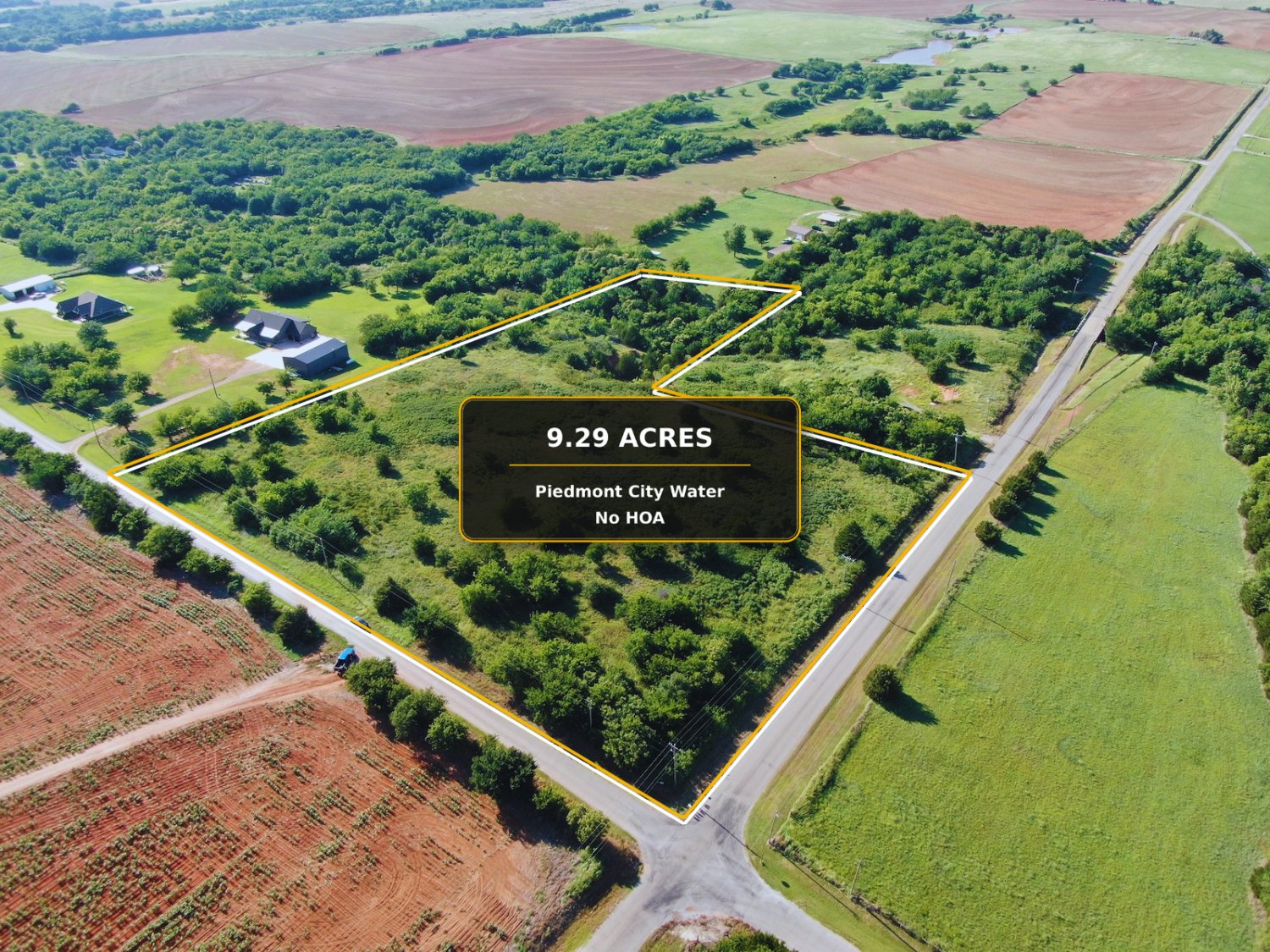 Aerial with 9.29-acre parcel boundary outlined